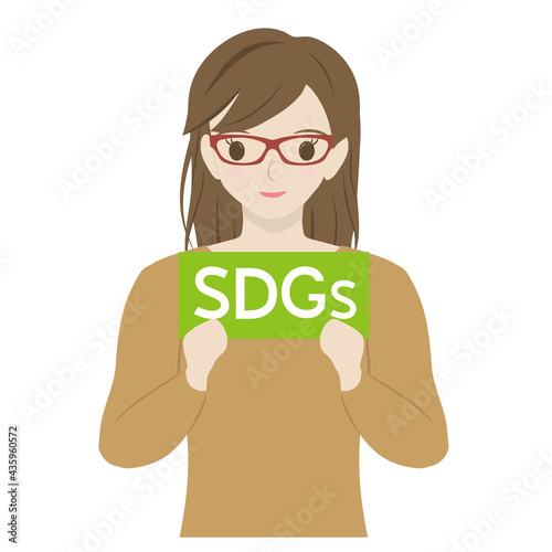 SDGsと書かれた紙を持つ女性