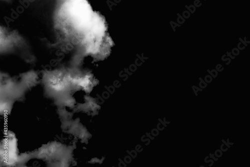 Dramatic white clouds black dark sky background outdoors shot.