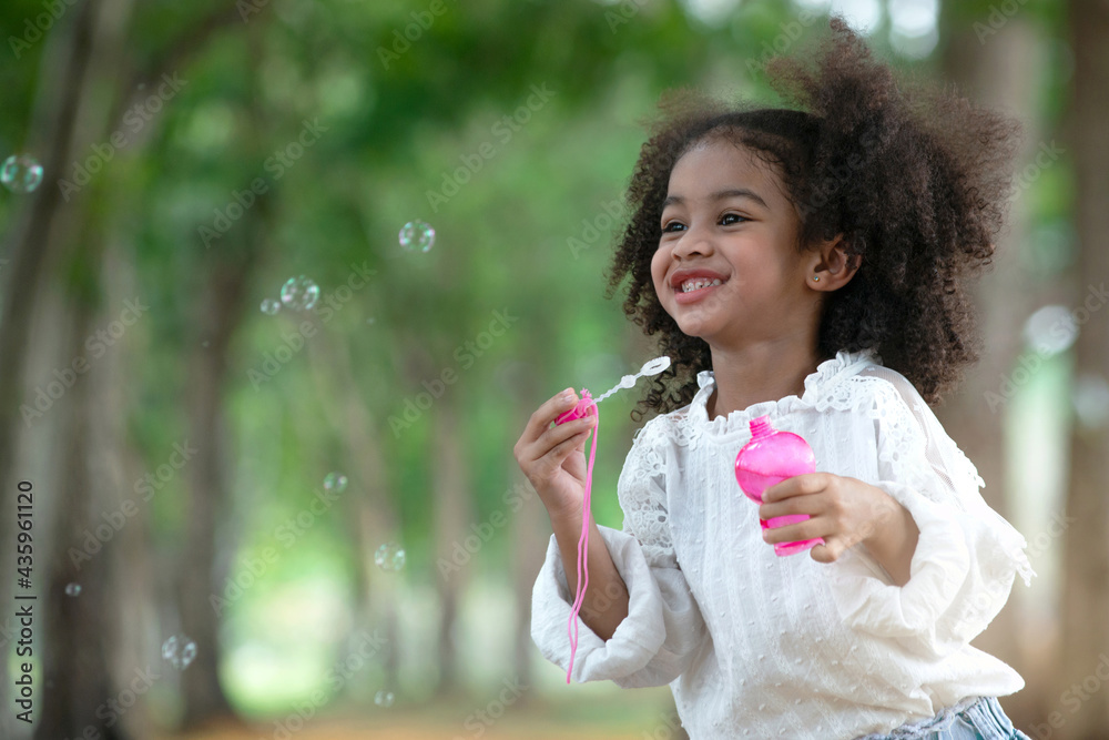 Little girl fun with soap in the park Little girl fun with soap in the park