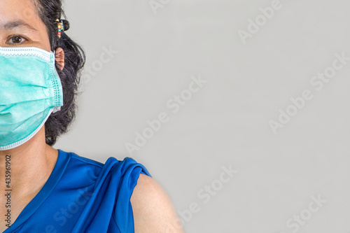 A woman wearing a surgical mask to prevent disease