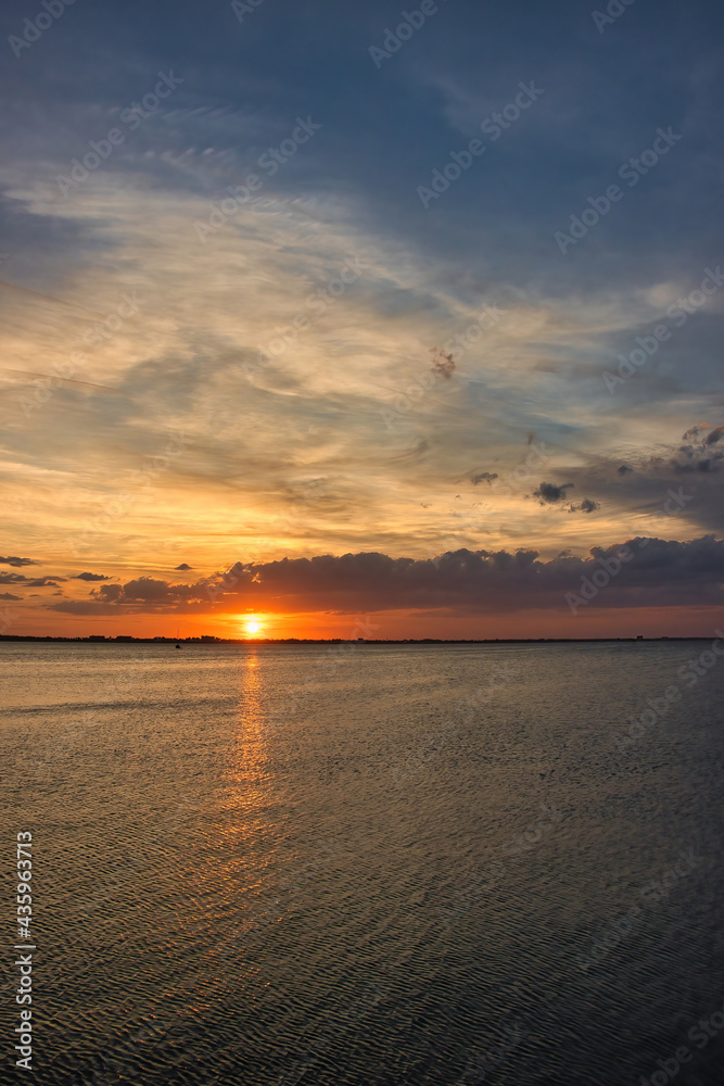 Fototapeta premium Sunset on a pier in Indialantic Florida on the Indian river