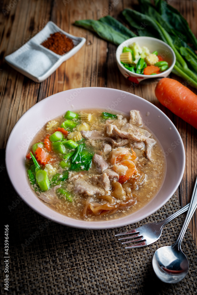 Fried noodle with pork in gravy sauce (Thai food called Rad Na Moo), Thai foods style. Fried noodle with pork in gravy sauce (Thai food called Rad Na Moo), Thai foods style.