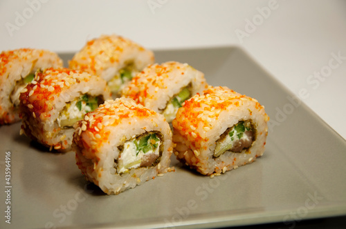 Asian food sushi rolls on a gray plate. High quality photo