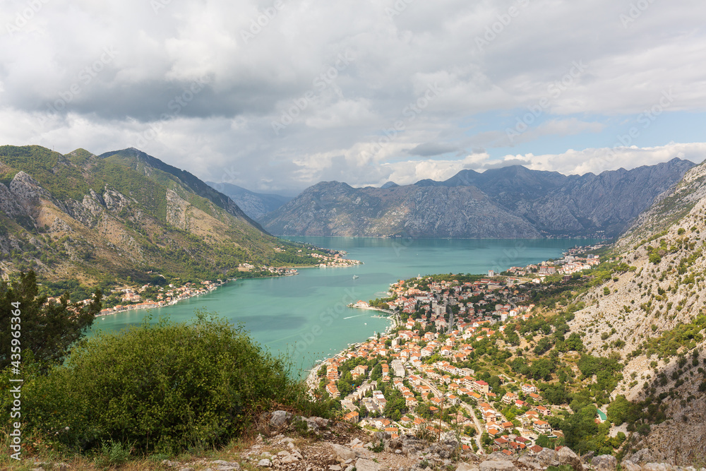 Top view of old town Kotor and Boka Kotorska bay on the Adriatic sea in summer day.