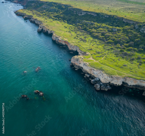 Aerial view with picturesque rocky coastline, nature park Yailata at the Black Sea coast, Bulgaria photo