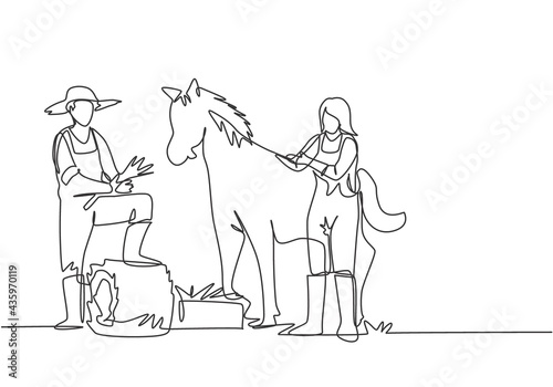 Single one line drawing of male farmer stomped one of its feet into the curled hay as it was about to feed the horse. A female helps to pet the horse. One line draw design graphic vector illustration.