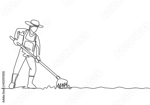 Continuous one line drawing young male farmer leveling the ground using a rake. Start a new planting season. Successful farming minimalist concept. Single line draw design vector graphic illustration.