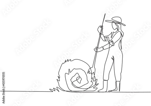 Single continuous line drawing young female farmer was stabbing a haystack and rolling it up with a straw stick. Farming minimalism concept. Dynamic one line draw graphic design vector illustration.