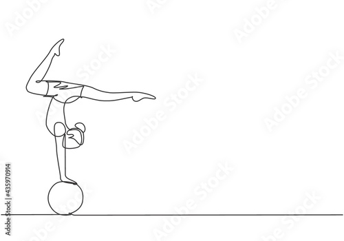 Single one line drawing a female acrobat performs a hand stand on a circus ball while performing a beautiful leg dance. Need dexterity to do it. Continuous line draw design graphic vector illustration