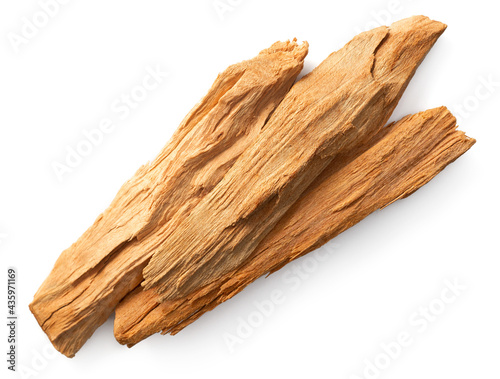 sandalwood sticks isolated on white background, top view photo