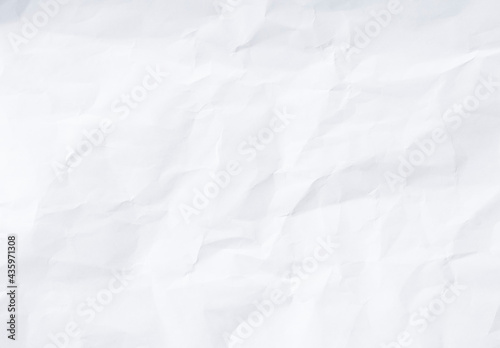 Flat crumpled white paper texture background