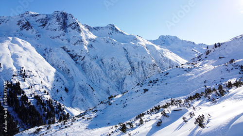 Mountain in Galtür covert with snow with a ski slope. This photo is taken in Galtür that is in Tirol Austria. © Sjoerd