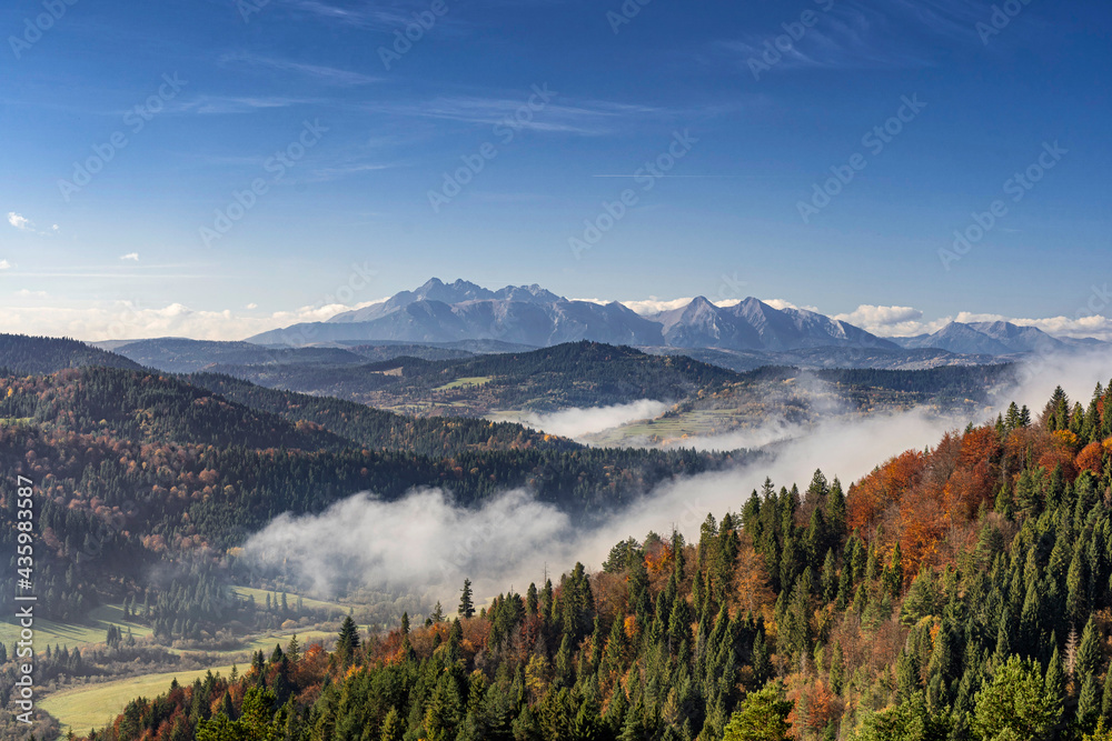 Scenic view of beautiful autumn landscape with High Tatra Mountains in background, Slovakia..