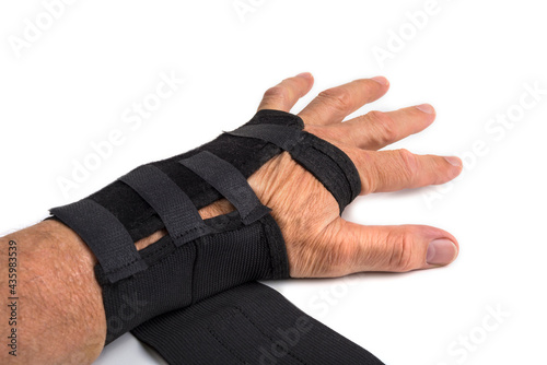 Black hand splint on a white background
