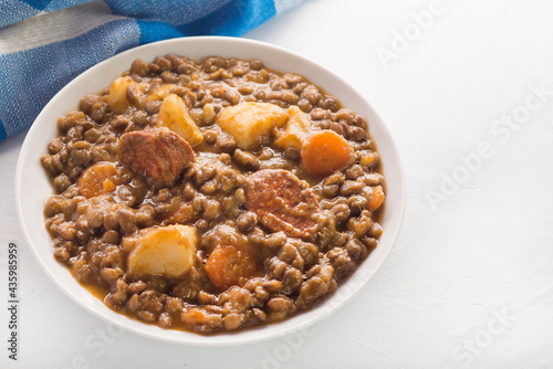 Spanish lentils with potatoes, carrot and chorizo