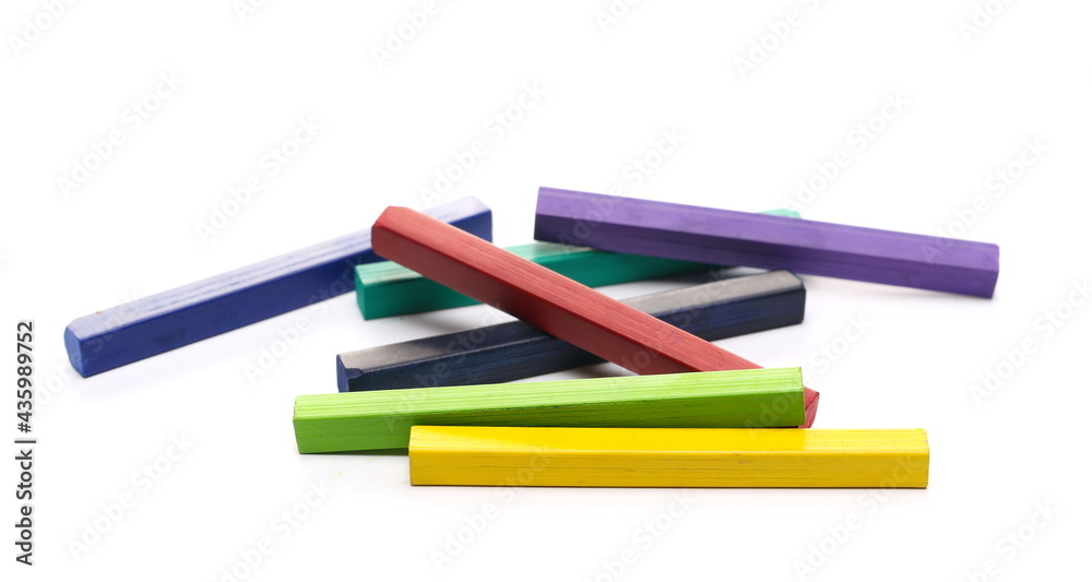 Fototapeta premium Colorful chalks pile isolated on white background