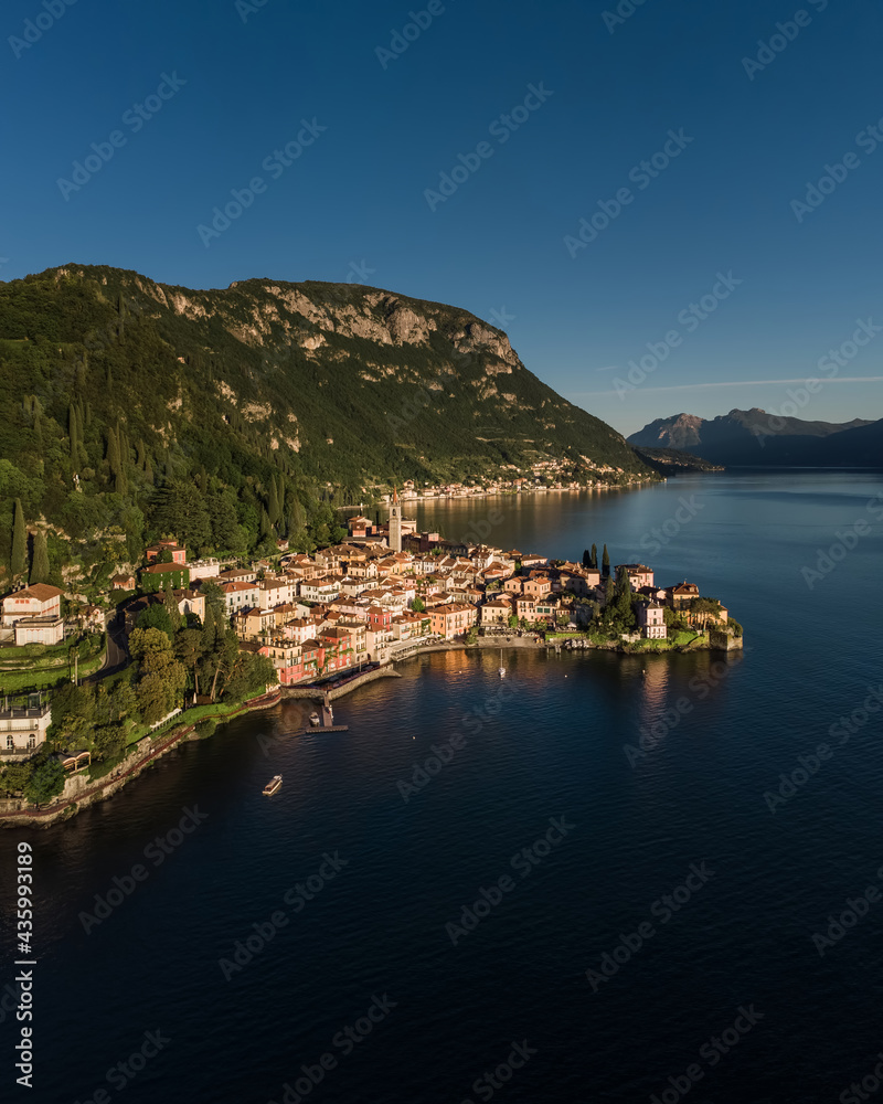 Vertical aerial shot of Varenna on lake Como, Lombardy,. Sunset picture of village on the Lake.