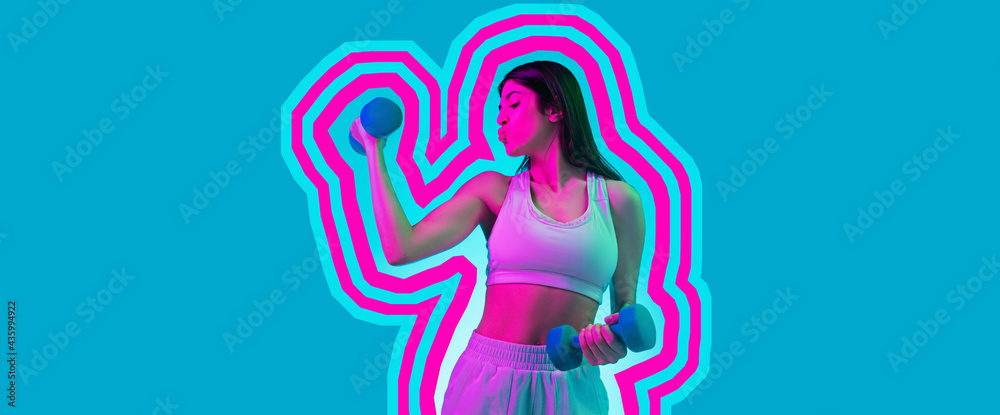 Obraz premium Young beautiful fitness girl training isolated over blue pink background in neon light. Concept of beauty, sport, ad. Flyer