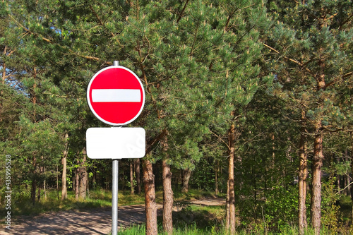 No entry into the forest sign and place for an inscriptio Mock up. photo