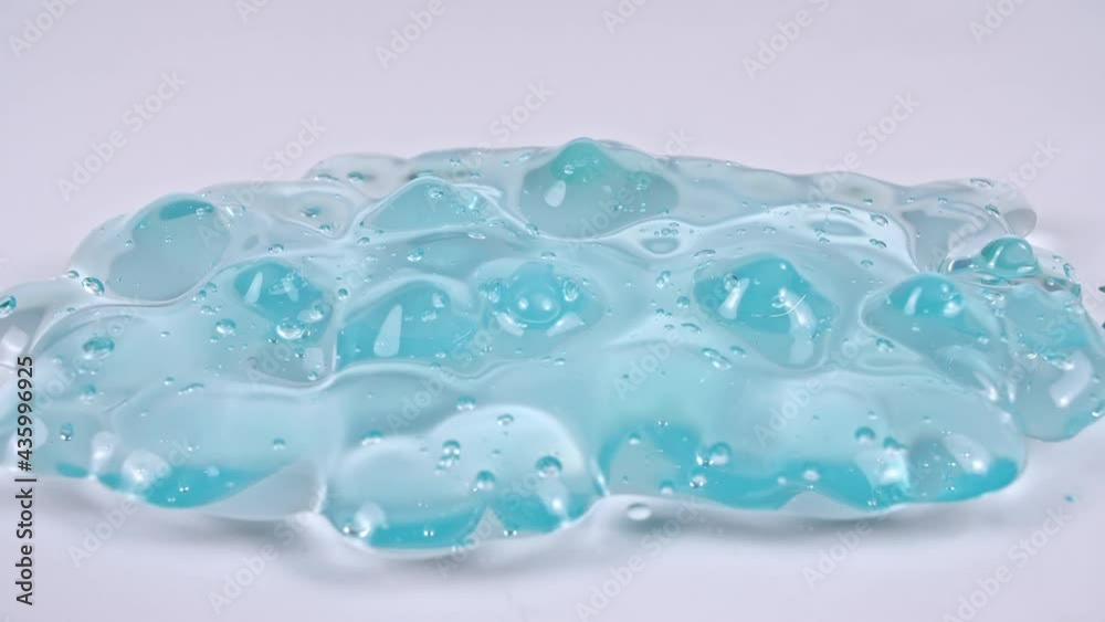 Drops the Blue Cosmetic Gel Cream With Molecule Bubbles. Organic cosmetics, medicine. Macro Shot. High quality 4k footage Drops the Blue Cosmetic Gel Cream With Molecule Bubbles. Organic cosmetics, medicine. Macro Shot. High quality 4k footage
