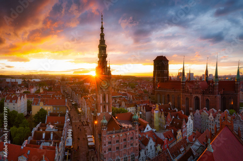 Amazing architecture of the main city in Gdansk at sunset, Poland. Aerial view of the Long Market, Main Town Hall and St. Mary Basilica