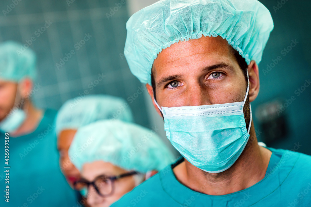Exhausted surgeons at the emergency room as a sign of stress and overwork Exhausted surgeons at the emergency room as a sign of stress and overwork