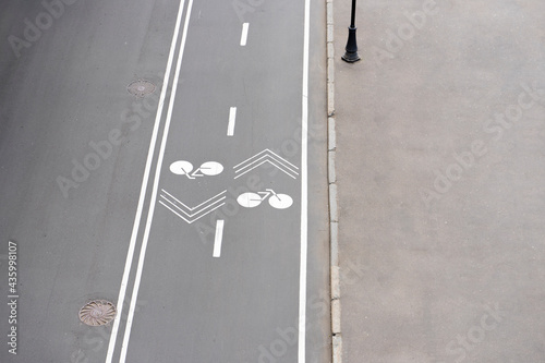 Bike path in the park top view. Road markings. Pedestrian zone. photo