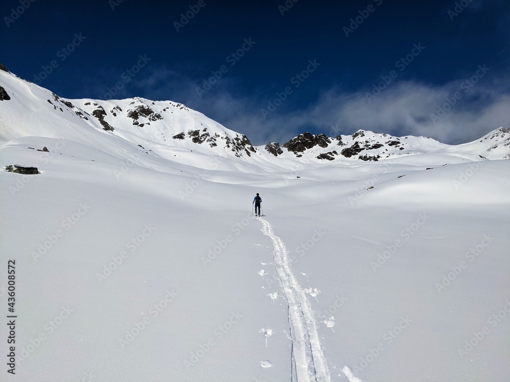 ski touring trail in the mountains. Alps in Europe,Switzerland.Ski mountaineering on the sentisch horn mountain in davos