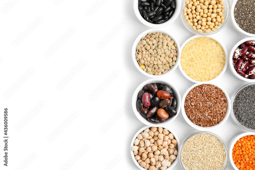 Various raw veggie seeds in bowls on white background, top view Various raw veggie seeds in bowls on white background, top view