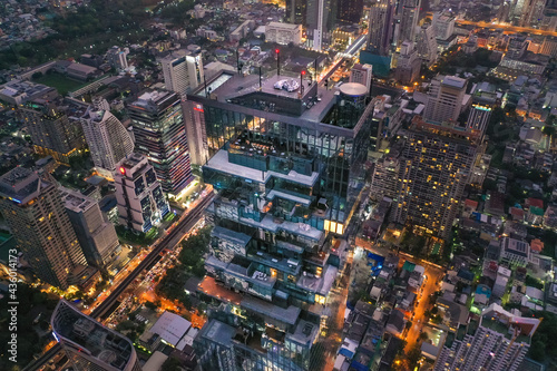 Aerial view of Sathorn district during covid lockdown quarantine, Chong Nonsi, King Power Mahanakhon tower and skywalk in Bangkok, Thailand