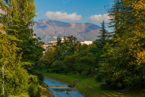 Bild auf Leinwand TIRANA, ALBANIA: The Lana River flowing very low after a summer drought in Tirana