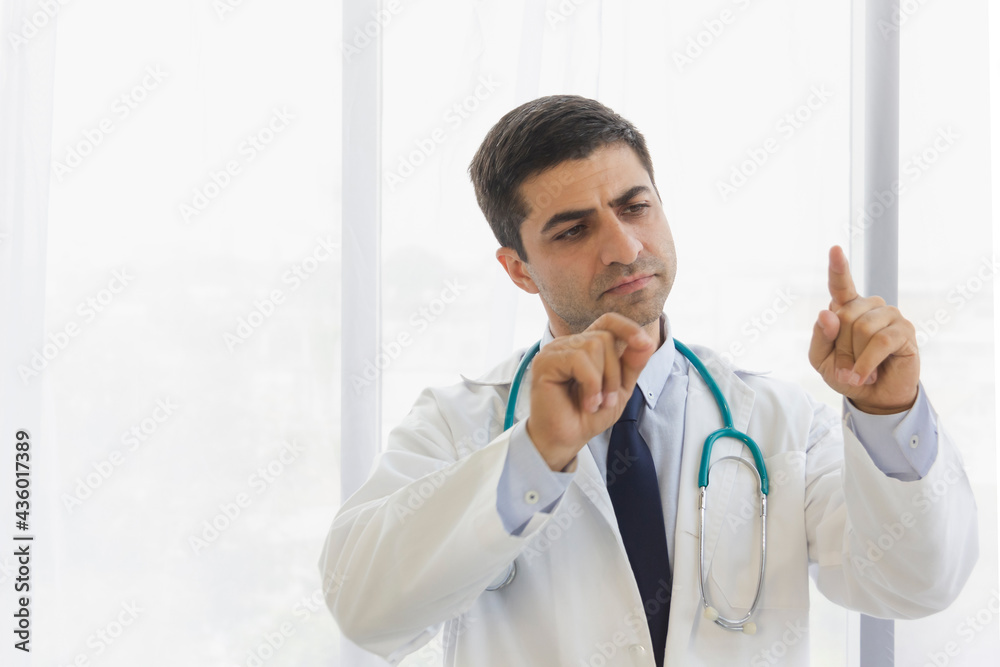 male doctor raised two finger for posture with white room background male doctor raised two finger for posture with white room background