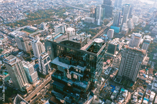 Aerial view of Sathorn district during covid lockdown quarantine, Chong Nonsi, King Power Mahanakhon tower and skywalk in Bangkok, Thailand photo