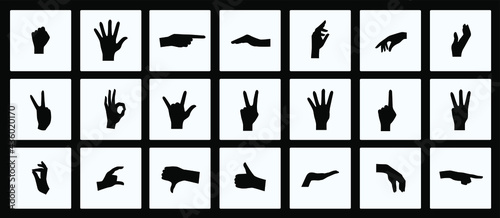 Monochrome set of silhouettes of hands and fingers. Icons are included, such as finger interaction, good job, index finger, greeting, pinch, dislike, like, peaceful person, good, rock, and others.