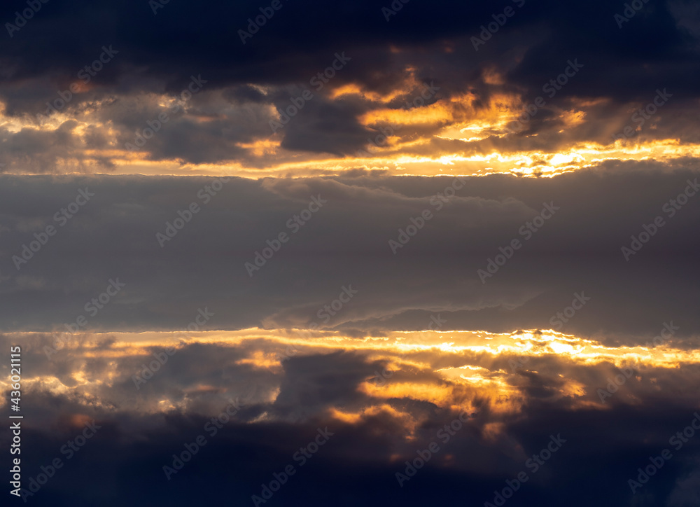 clouds and reflections at sunset