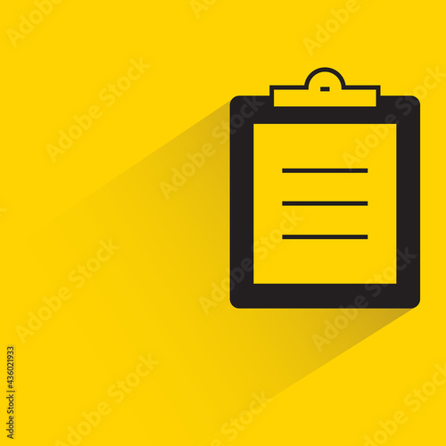 clipboard shadow on yellow background
