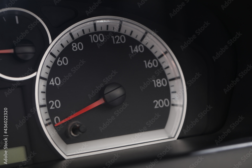 Speedometer on modern car dashboard, closeup view Speedometer on modern car dashboard, closeup view