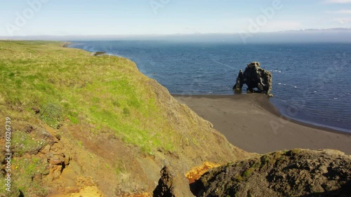 Hvitserkur 15 meter high basalt stack in Iceland, zoom out view photo
