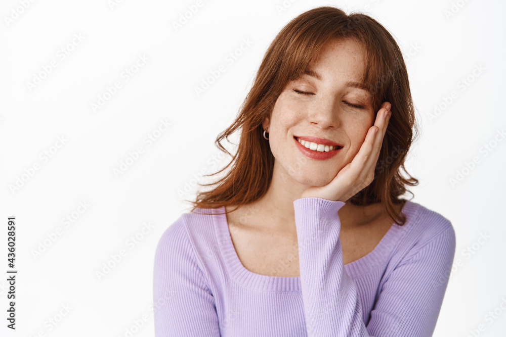 Lovely smiling woman with make up and red lips, dreaming, close eyes and lean on hand romantic, remember heartwarming memories Lovely smiling woman with make up and red lips, dreaming, close eyes and lean on hand romantic, remember heartwarming memories