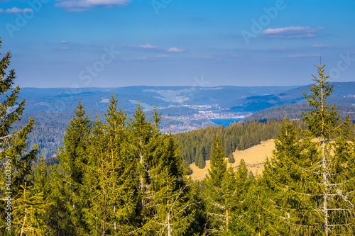 Germany, Schwarzwald panorama view dreiseenblick from mountain top near feldberg to titisee neustadt lake down in the valley under blue sky