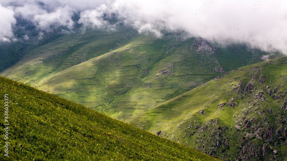 High resolution, magnificent mountain view captured from a high angle by a drone camera. This landscape, accompanied by very high clouds, has a rare bauty. High resolution, magnificent mountain view captured from a high angle by a drone camera. This landscape, accompanied by very high clouds, has a rare bauty.