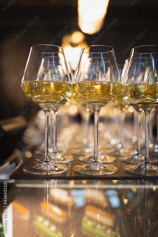 transparent glasses with champagne in a restaurant close-up