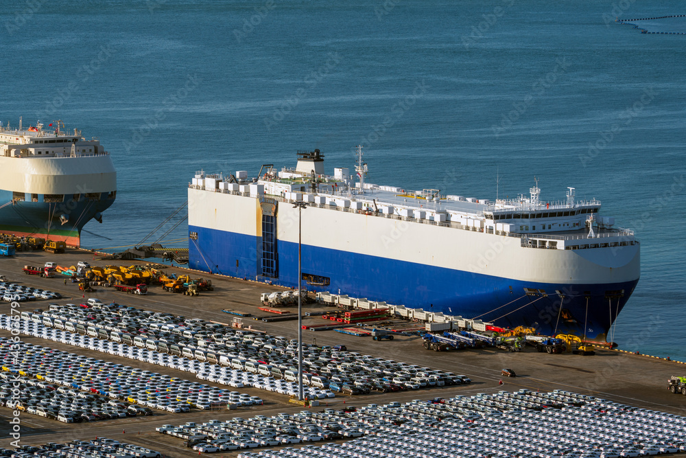 Anchored car carriers and imported cars.