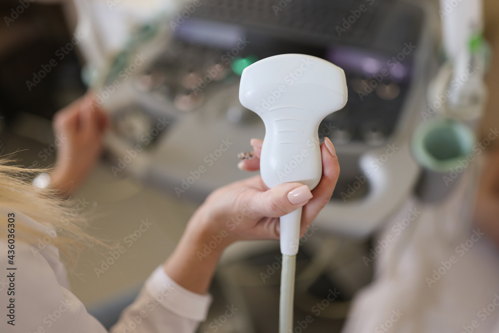 In doctor hand, equipment for ultrasound examination of internal organs
