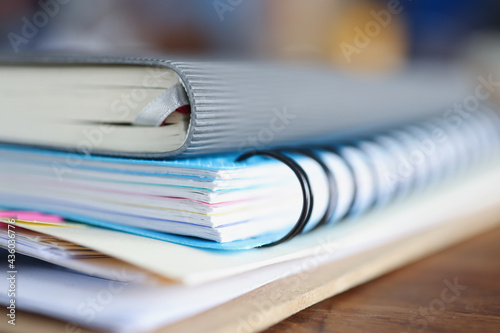 Diary and notebook and documents are on table