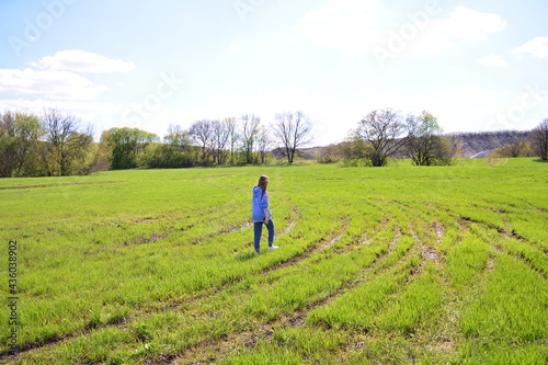 person walking in the field