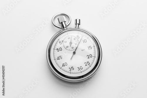 Shiny stopwatch on gray background