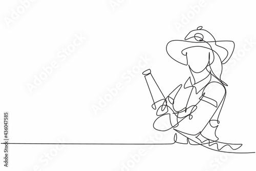 Obraz na plátně Single one line drawing of young female firefighter holding water nozzle
