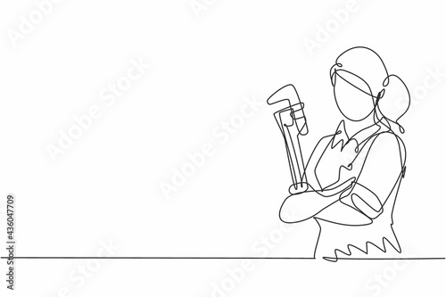 Single continuous line drawing of young female plumber holding pipe wrench cross arms on chest. Professional work job occupation. Minimalism concept one line draw graphic design vector illustration