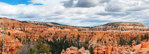 Bryce Canyon, Utah, USA. Panoramic view of Bryce Amphitheater with countless hoodoos under a cloudy sky.